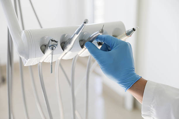 Professional Tooth Extraction technician working in Woxall, PA